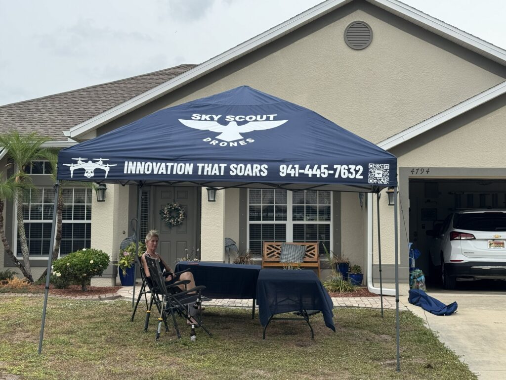 Sky Scout Drones pop-up canopy, table, and equipment set up for a community event