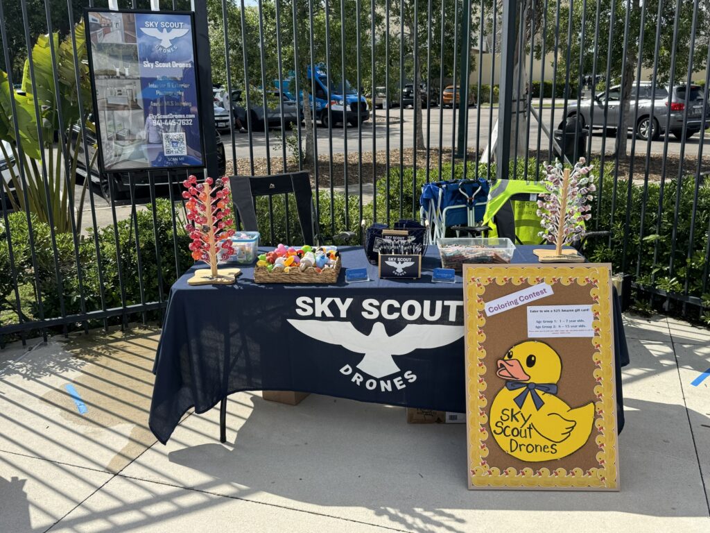 Sky Scout Drones event table and equipment set up for a community duck race