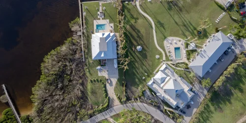 Hurricane Ian destroyed homes in Florida residential area on golf course. Natural disaster and its consequences
